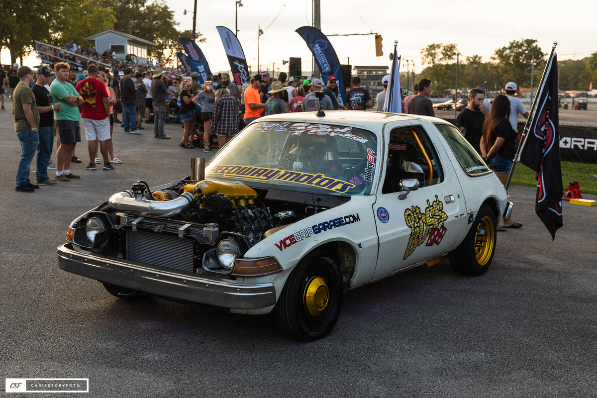 Poppy's Patina Pit Boss 1976 AMC Pacer at a car event