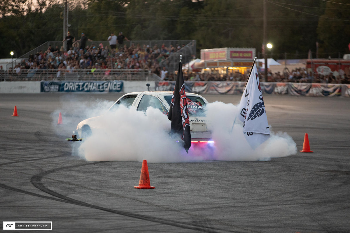 Pit Boss AMC Pacer in a cloud of tire smoke between traffic cones