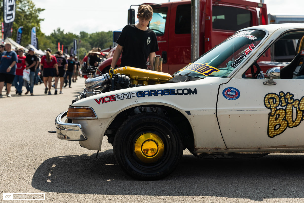 Side detail of the Pit Boss AMC Pacer with a gold wheel and a Vice Grip Garage decal