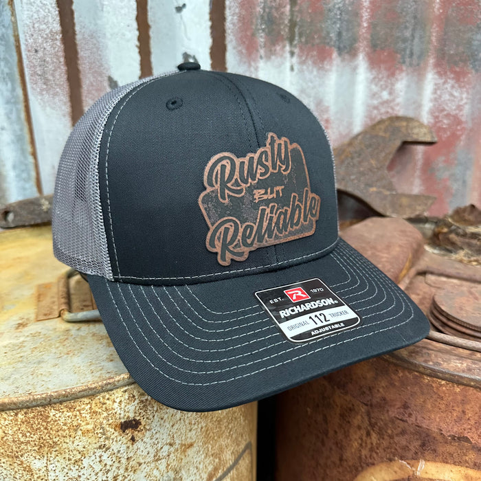 Leather Rusty But Reliable Patch Adjustable Trucker Hat (Richardson 112) Black/Dark Gray